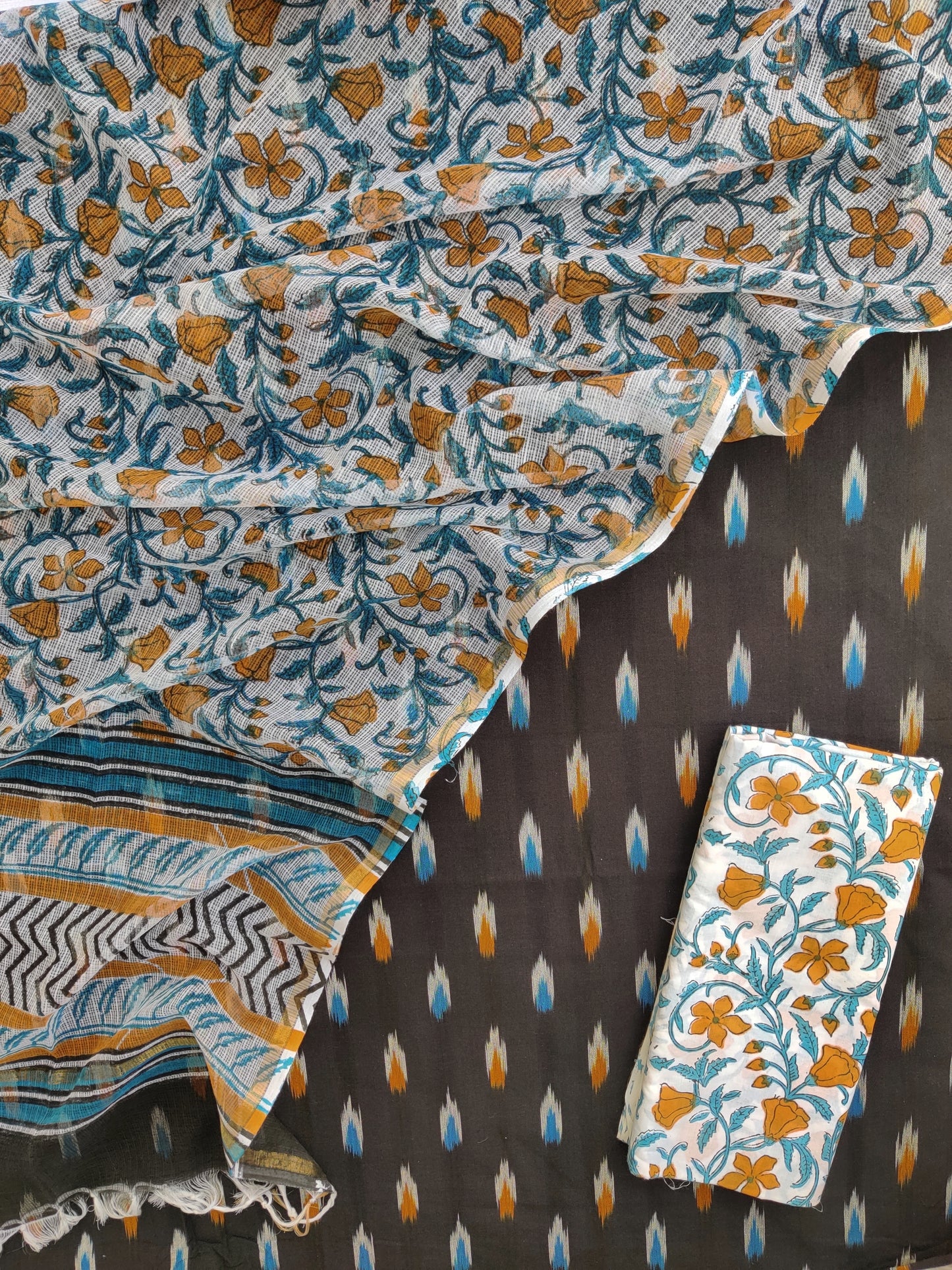 Handloom Weave Ikat Suit with Kota Doria Dupatta