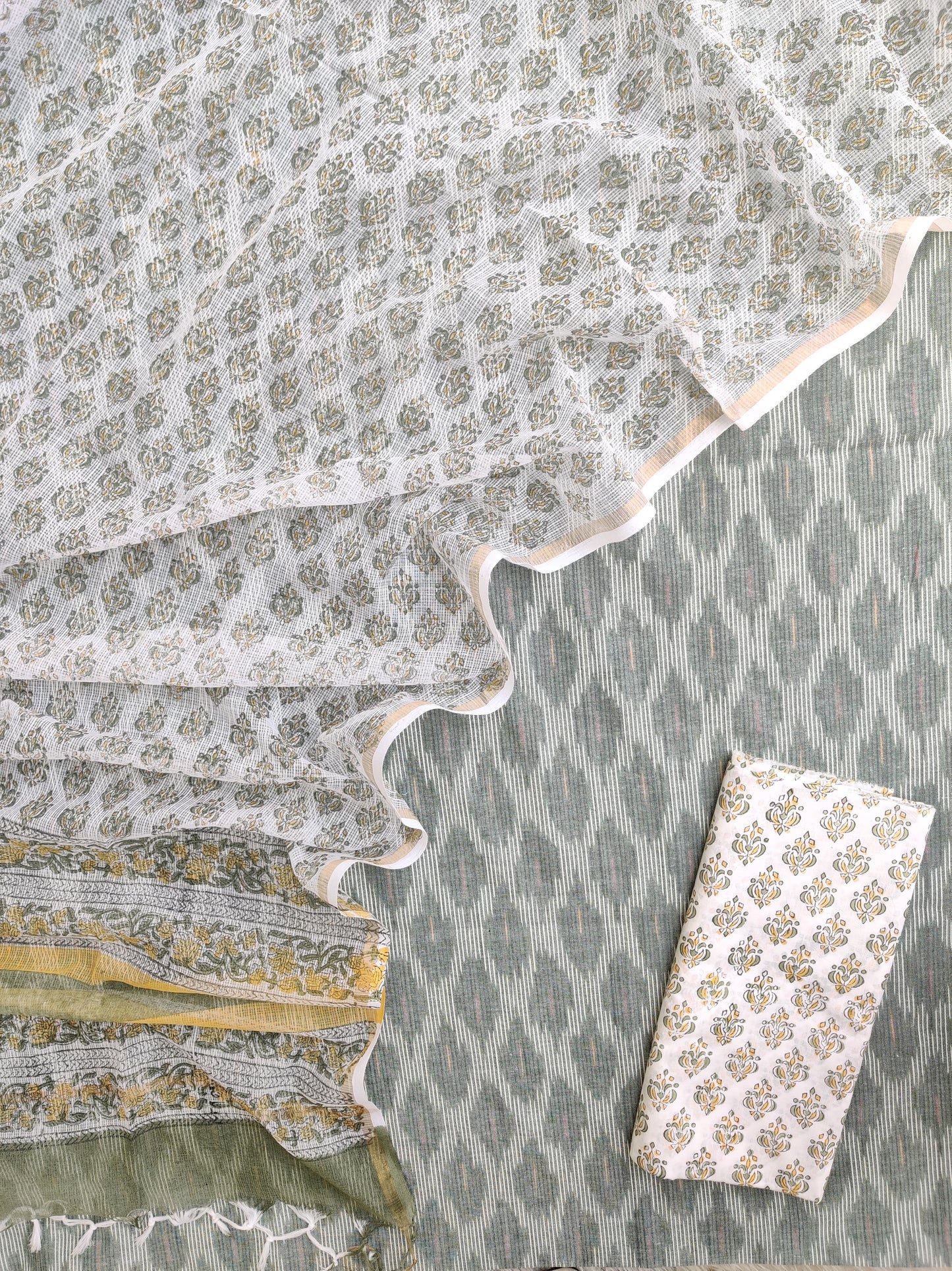 Handloom Weave Ikat Suit with Kota Doria Dupatta